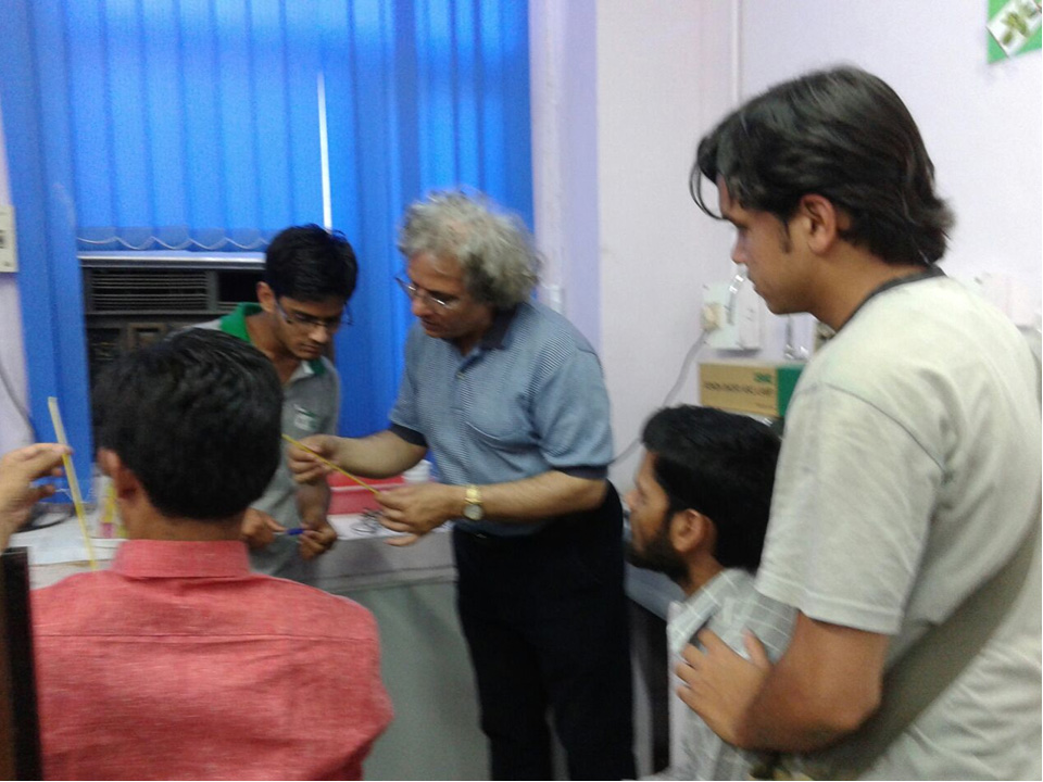 Prof. Bal Ram Singh Performing Experiments with JNU Students